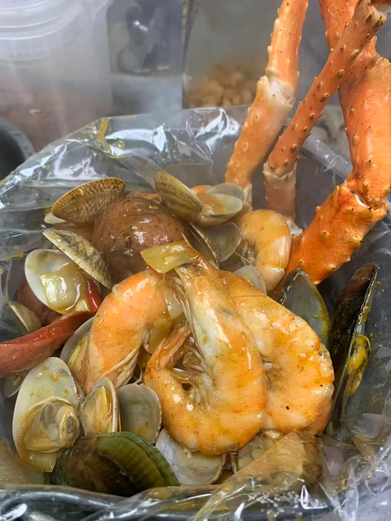 Spicy cajun seafood boil with king crab legs and shrimp at Asian N Cajun 2, a Asian Fusion Cajun Seafood Restaurant in Fair Oaks